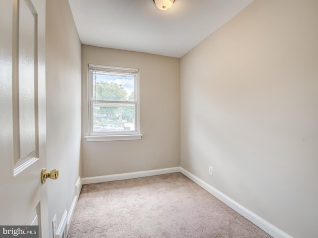 empty room with carpet flooring