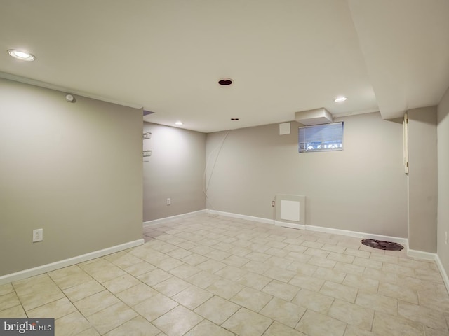 basement with light tile patterned floors