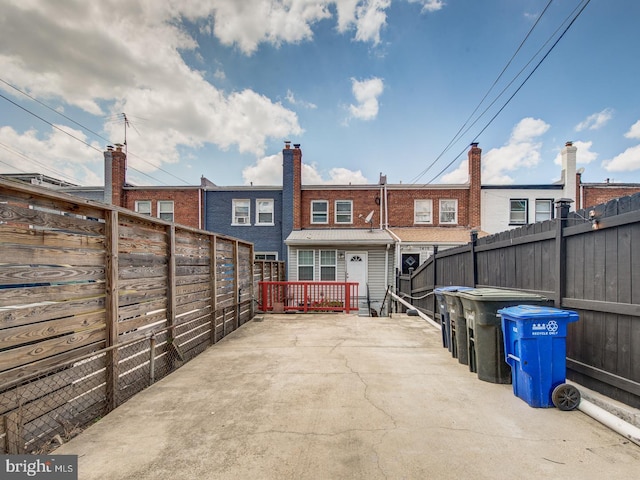 rear view of house featuring a patio