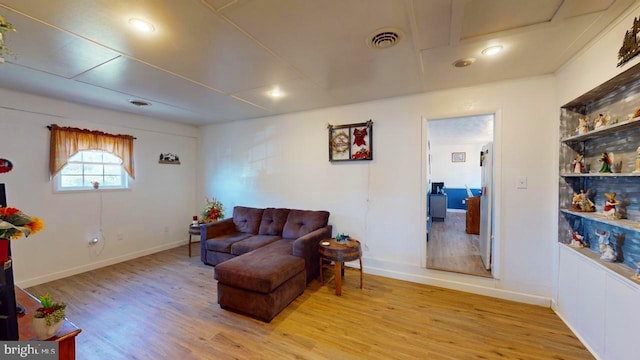 living room with light hardwood / wood-style floors