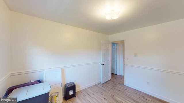 bedroom with light wood-type flooring