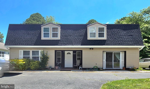 view of new england style home