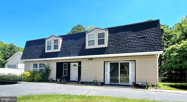 view of new england style home