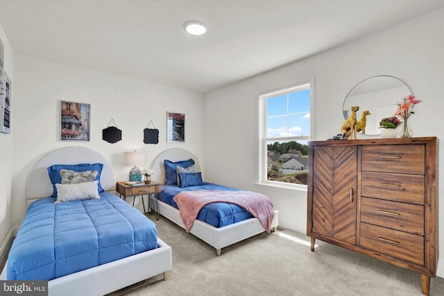 bedroom featuring carpet