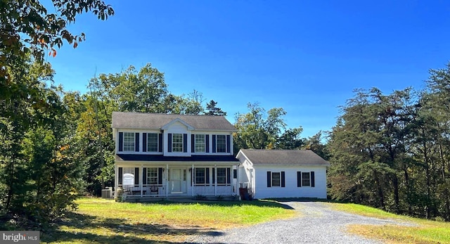 colonial-style house with a porch