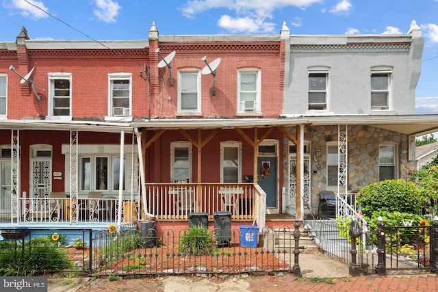 view of property featuring a porch