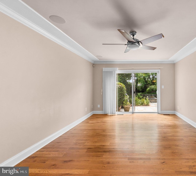 unfurnished room with light hardwood / wood-style flooring, ceiling fan, and crown molding