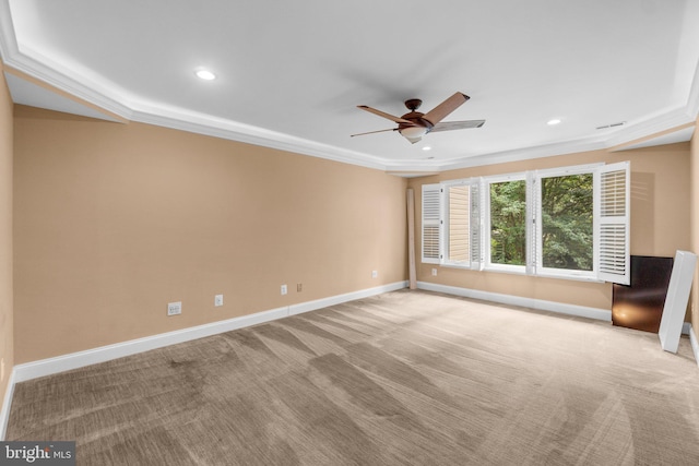 interior space with light carpet, ceiling fan, and ornamental molding