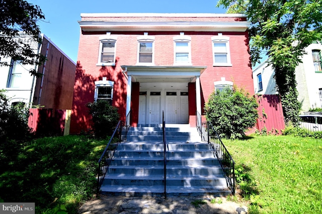 view of front of house with a front yard