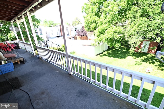 balcony featuring covered porch