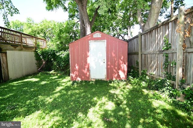 view of outdoor structure with a lawn