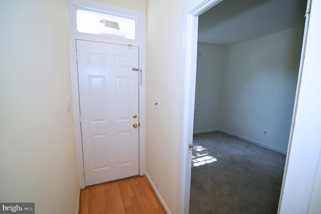 doorway with light hardwood / wood-style flooring