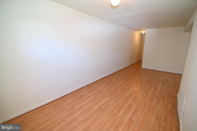 empty room with light wood-type flooring