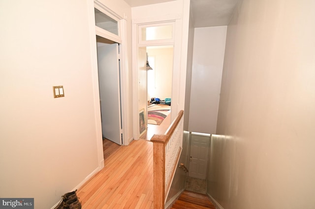 corridor featuring light wood-type flooring