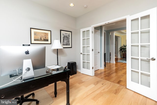 office with french doors and wood-type flooring