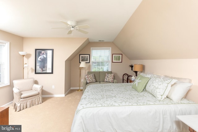 carpeted bedroom featuring ceiling fan and lofted ceiling