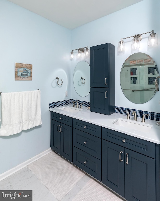 bathroom with vanity, tile patterned floors, and a shower with door