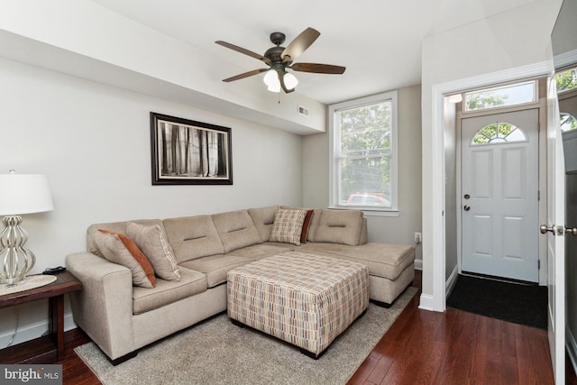 living room with hardwood / wood-style floors and ceiling fan