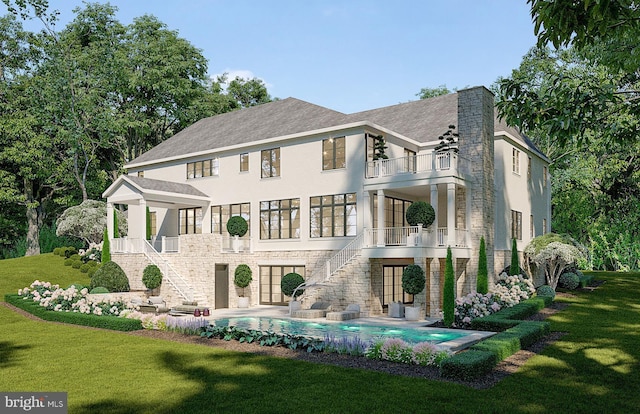 913 Whann Ave, Mclean, VA 22101 - back of house featuring a balcony, stairway, stone siding, and a lawn