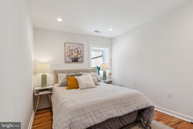 bedroom featuring hardwood / wood-style flooring