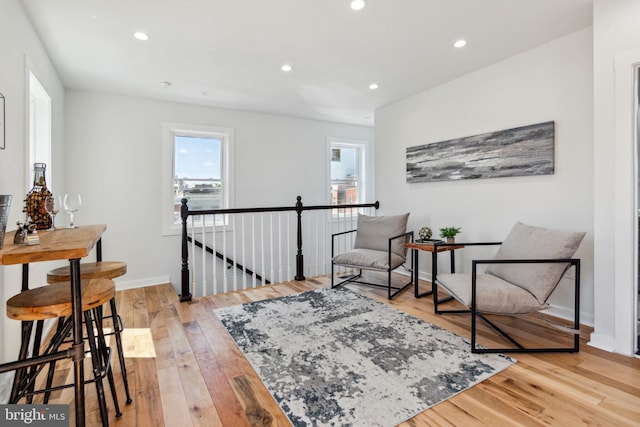 living area with light hardwood / wood-style floors