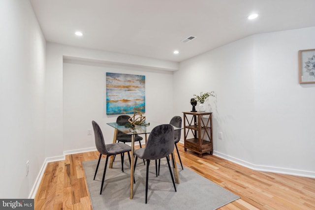 dining room featuring hardwood / wood-style flooring