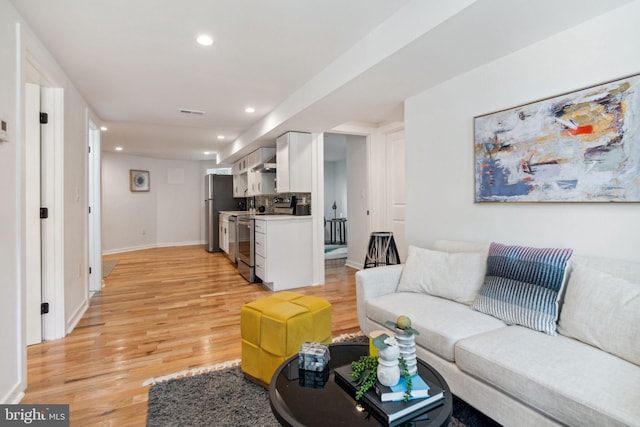 living room with light wood-type flooring