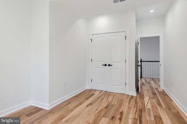 hall featuring light hardwood / wood-style flooring