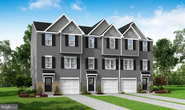 view of front facade featuring a front yard and a garage