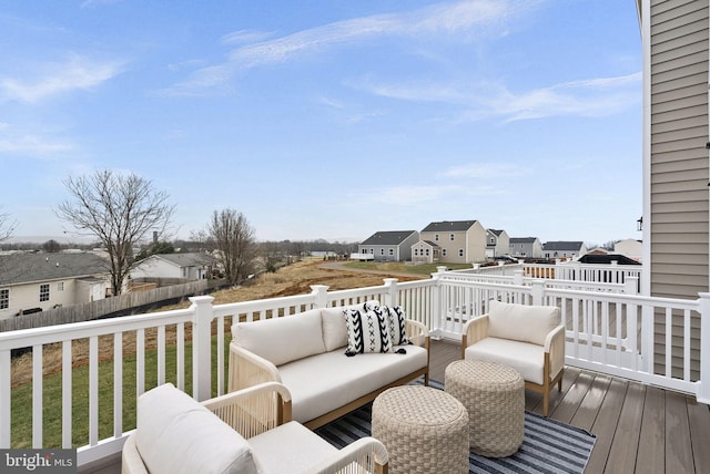 wooden deck featuring outdoor lounge area