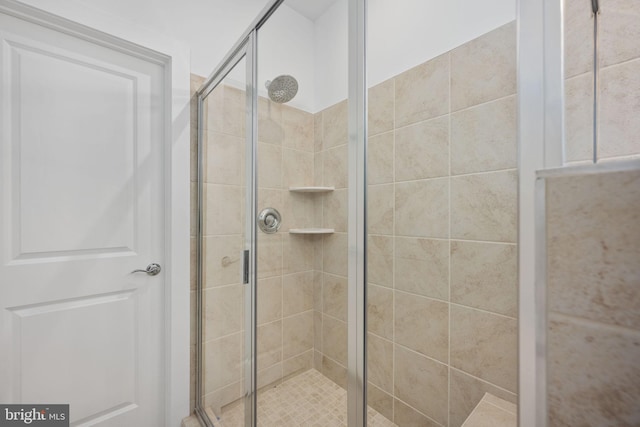 bathroom with an enclosed shower