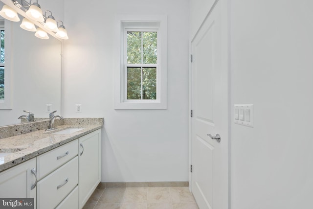 bathroom featuring vanity and tile patterned floors