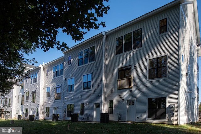 view of building exterior featuring central air condition unit