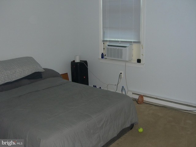 bedroom with carpet flooring, baseboard heating, and cooling unit