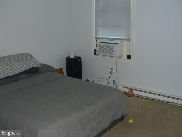 30087 Cross Woods Dr, Mechanicsville, MD 20659 - carpeted bedroom with a baseboard heating unit and cooling unit