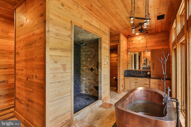 bathroom with vanity, wooden ceiling, tile patterned floors, wooden walls, and independent shower and bath