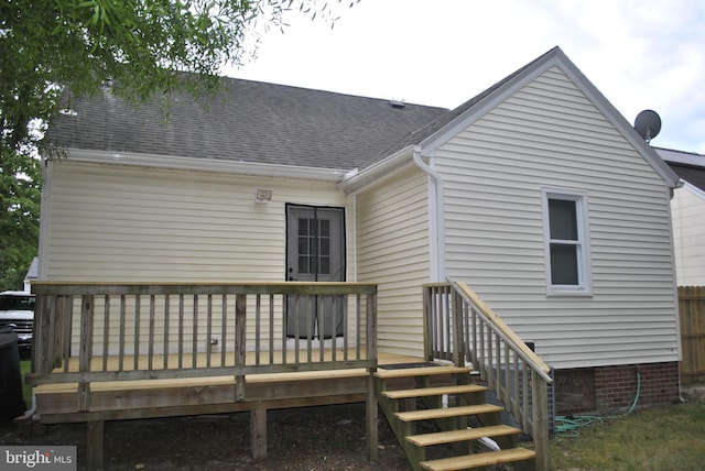 rear view of house with a deck