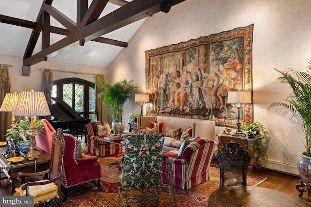 living room featuring hardwood / wood-style floors, lofted ceiling with beams, and french doors