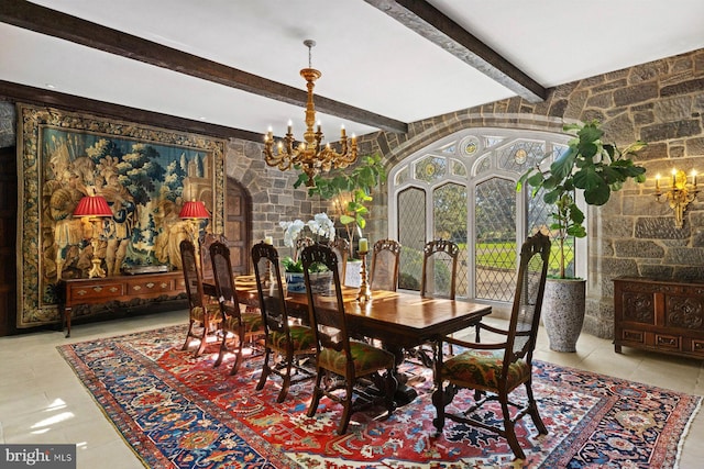 dining area featuring beamed ceiling, light tile patterned floors, and an inviting chandelier