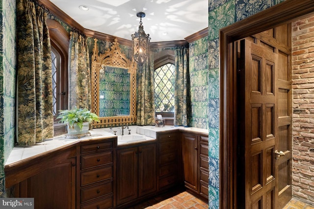 bathroom with plenty of natural light and vanity