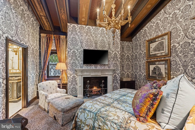 carpeted living room with beam ceiling, high vaulted ceiling, and a notable chandelier