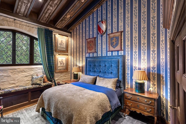 bedroom featuring beamed ceiling, crown molding, and coffered ceiling