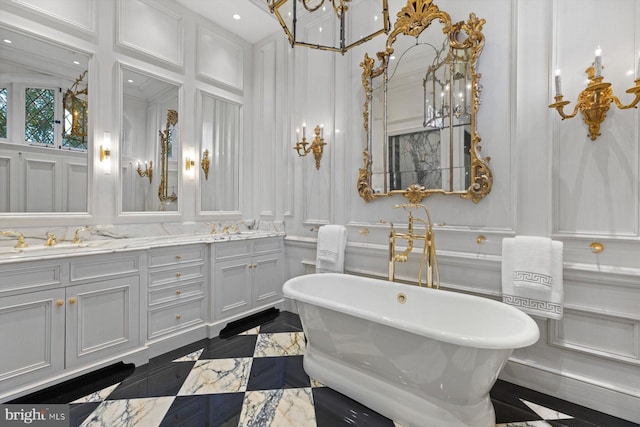 bathroom with vanity and a tub to relax in