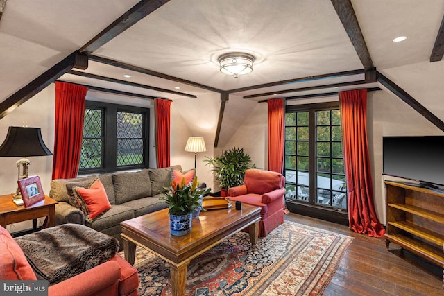 living room featuring beam ceiling and wood-type flooring