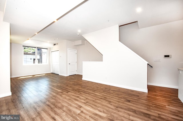 interior space with hardwood / wood-style flooring