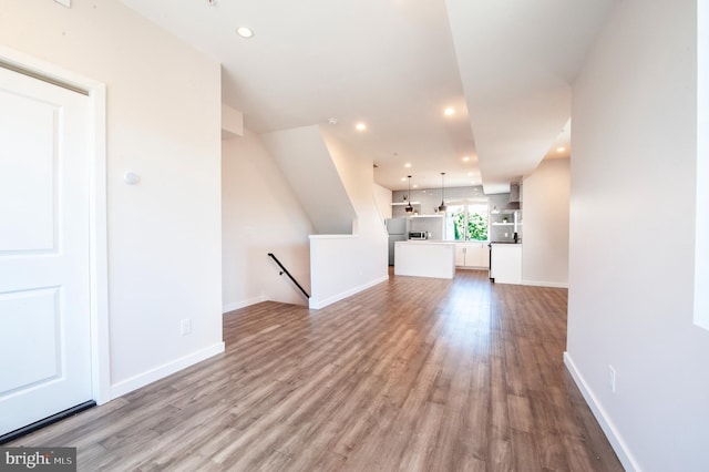 unfurnished living room featuring light wood-type flooring