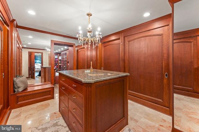 spacious closet featuring a notable chandelier