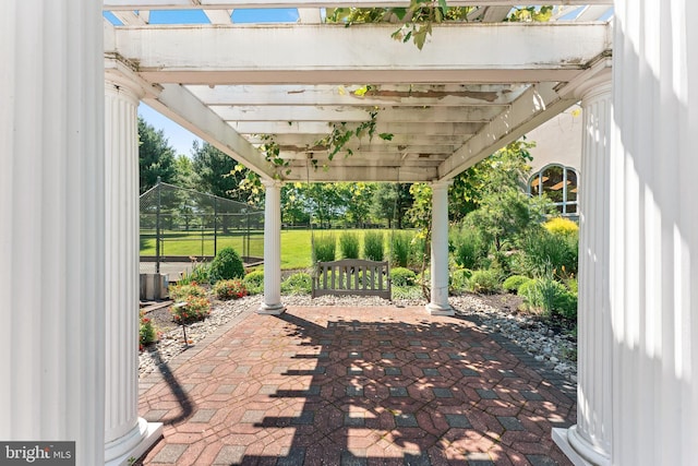 view of patio featuring a pergola