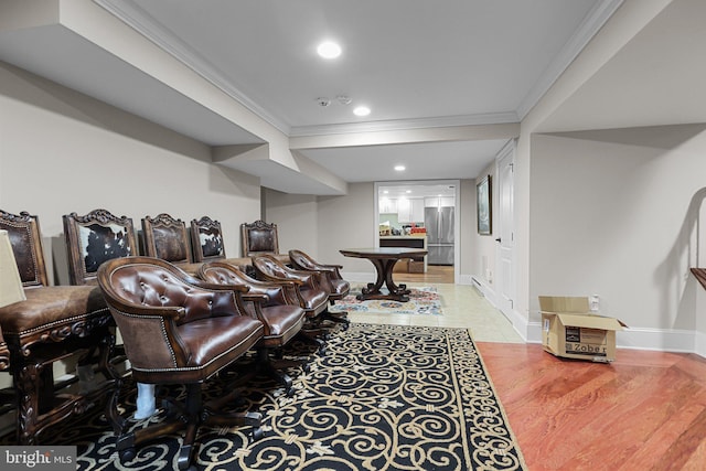 interior space with crown molding, light hardwood / wood-style floors, and pool table