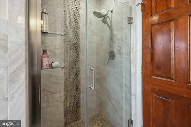 bathroom with an enclosed shower